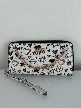 Xoxo wallet, black and white lettering and gold chain, new without tags.